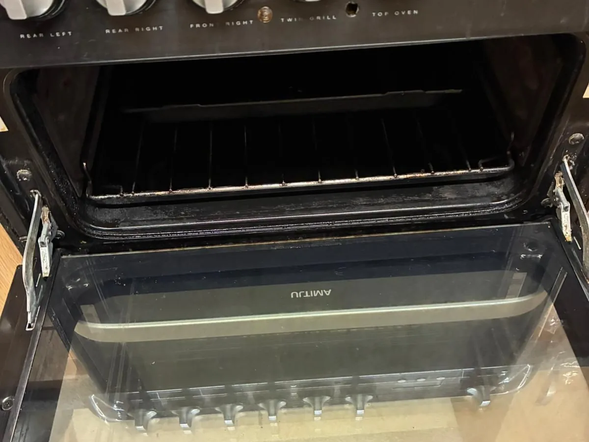 The same oven interior after cleaning, back to bare metal